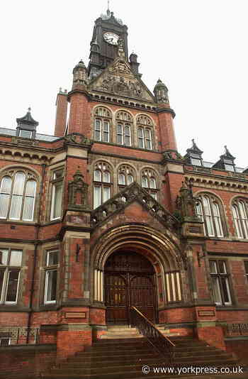 Grieving York man hit wife in face