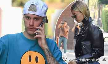 Justin Bieber hides his face as he is seen for the first time since he admitted he has Lyme disease