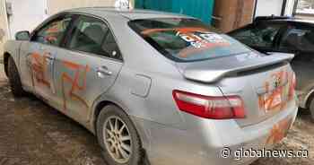 After taxi was spray-painted with swastikas, northern Alberta community rallied to help owner