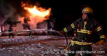 Firefighters battling 2 blazes in Minneapolis for hours in freezing cold