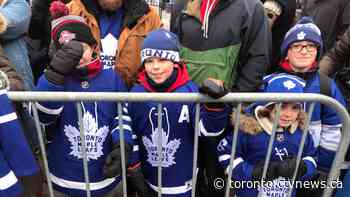 Toronto Maple Leafs fans watch outdoor practice at Nathan Phillips Square