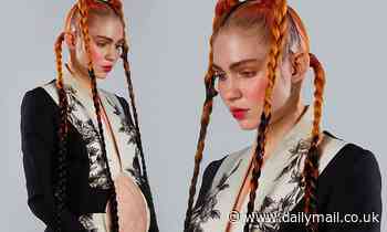 Grimes posts ANOTHER baby bump photo to Instagram after declaring herself 'knocked up' 