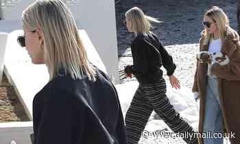 Hailey Bieber appears somber in sweats while house hunting with a friend in the Hollywood Hills