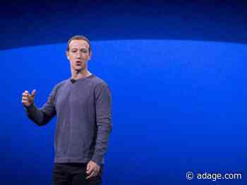 Mark Zuckerberg puts on his augmented reality goggles to look into the 2020s