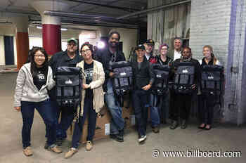 Leader Of The Pak: Paradigm Agent Ron Kaplan Delivers Custom Backpacks to the Neediest Among Us