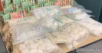 4 charged after cash, cocaine and meth seized from north Edmonton homes