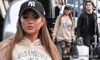 Love Island's Georgia Steel cuts a casual figure in ripped denim jeans and a hoodie