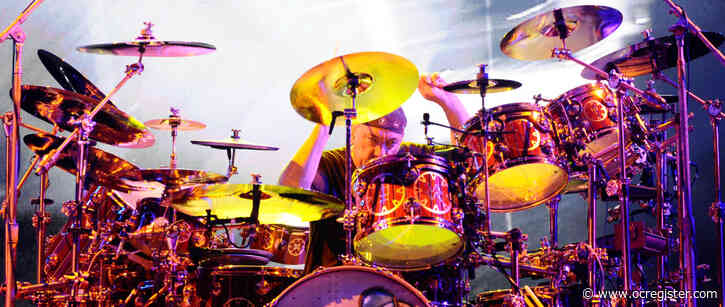 Photos: Remembering Neil Peart of Rush at 2011 Gibson Amphitheatre performance