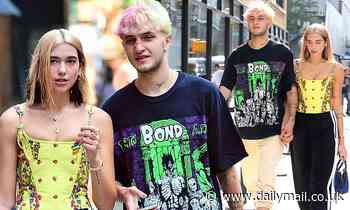 Dua Lipa beams with her boyfriend Anwar Hadid after her £9M earnings were revealed
