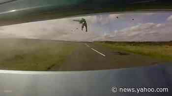 Footage shows horrific crash as motorcyclist is hit by car