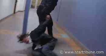 Duluth police officer who dragged handcuffed man through skywalk is back at work