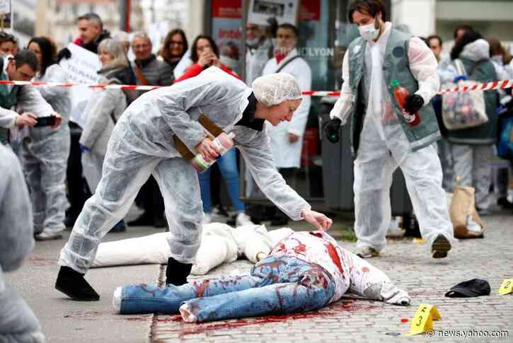 Protesting French forensic police recreate giant crime scene in Lyon
