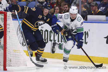 Boeser nets a pair to lift Canucks past Sabres 6-3