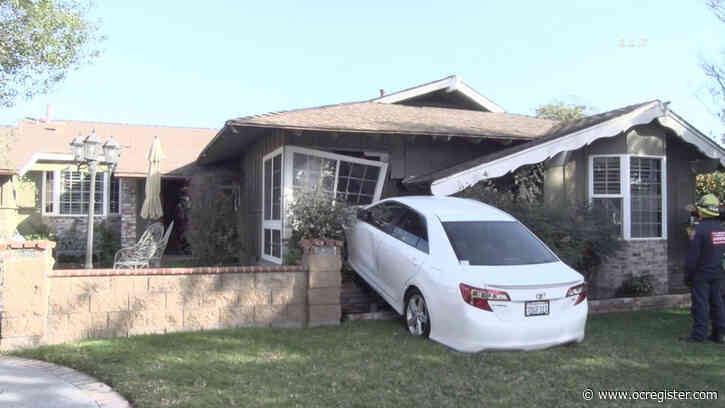 Car jumps curb and planter, bangs up a window at Anaheim house
