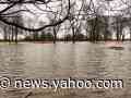 Storm cancels over 1,000 flights in Chicago and triggers flooding along lakeshore