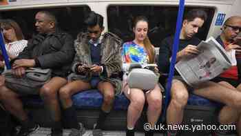 London commuters strip down to their pants for No Trousers Tube Ride