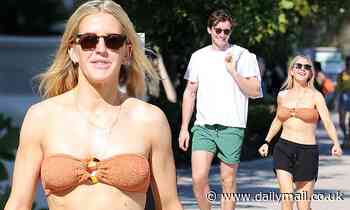 Ellie Goulding shows off toned abs in bikini with her husband Caspar Jopling in Miami