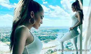 Jennifer Lopez flaunts her gym-honed physique as she continues rehearsals for Super Bowl show