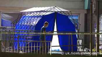 Cordon at hospital after man has substance thrown in face