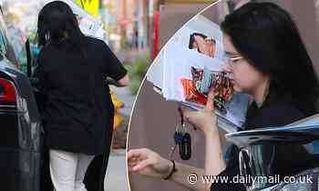 Ariel Winter dresses down in a t-shirt and sweatpants
