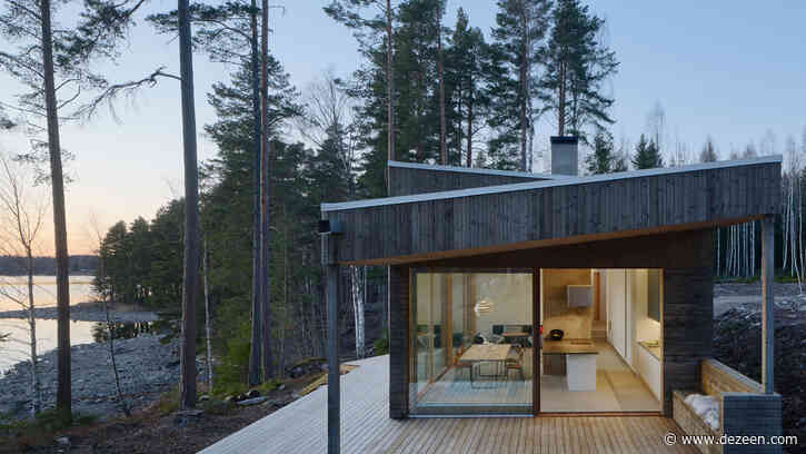 Lakeside house in Sweden is clad with pine slats to match the forest