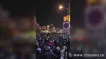 Anger in Iran over jet's downing; gunfire disperses protests