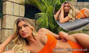 Love Island's Zara McDermott shows off her sensational figure in a skimpy orange bikini 