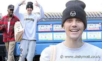 Justin Bieber grins from ear-to-ear leaving a dance studio...as Yummy peaks at #2 spot on Billboard