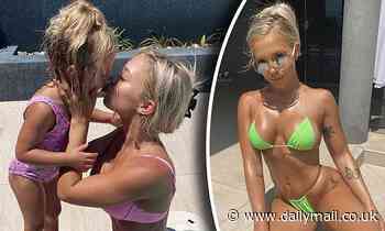 Tammy Hembrow bonds with lookalike daughter Saskia, three, in matching swimwear