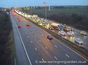 6 mile queues on M62 after lane closed