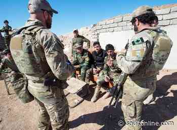 Federal opposition divided over Iraq mission as troops remain hunkered down
