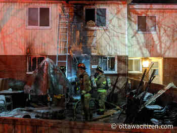 Two people displaced by fire at Russell Road townhouse