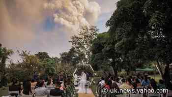 Wedding takes place despite nearby eruption of Taal volcano