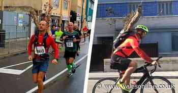 The man doing the equivalent of 12 Iron Mans in 12 months with a tree on his back