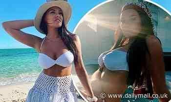Jess Wright shares sexy throwback snaps in a skimpy white bikini as she longs for some winter sun