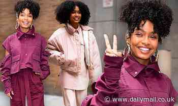Yara Shahidi flashes peace sign as she shows off fashionista credentials in TWO wintry chic outfits