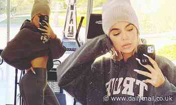 Khloe Kardashian models a sweatshirt with her daughter True's name on front