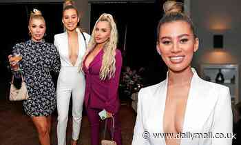 Montana Brown flashes cleavage as she's joined by Olivia Buckland and Ellie Brown at event