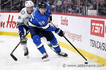 Hellebuyck makes 41 saves as Jets blank Canucks 4-0