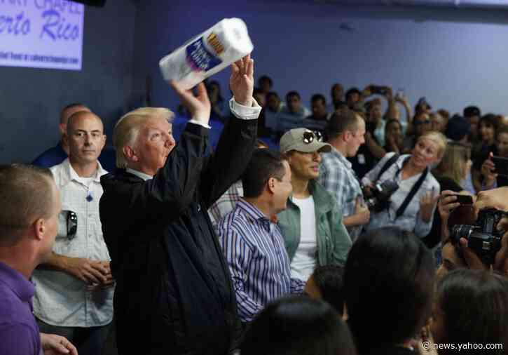 Democrats unveil billboard of Trump tossing paper towels