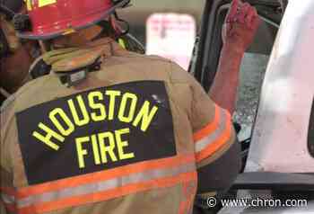 Pair survive violent crash that trapped driver in southwest Houston