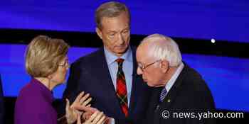 Bernie Sanders said he was talking about 'the weather' with Elizabeth Warren in viral moment at end of Iowa debate