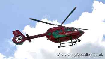 Elderly man found unconscious in car near Bridgend airlifted to hospital