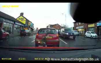 Watch: Child's lucky escape after being hit by van in Belfast after dash across main road