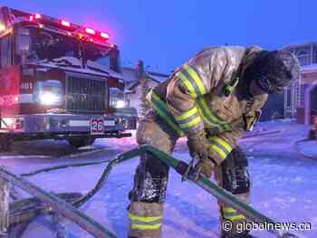 Edmonton firefighters battle blaze at home amid frigid temperatures