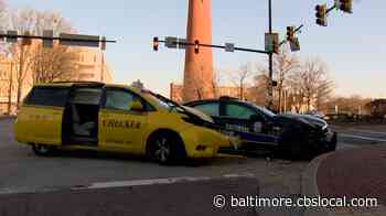 Taxi, Police Car Crash In Downtown Baltimore; Officer Taken To Hospital
