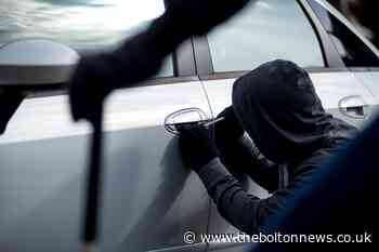 Police warning over men 'acting suspiciously' near cars