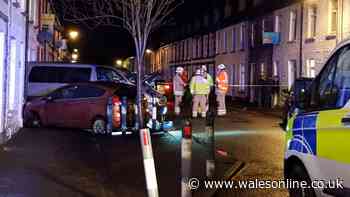 Van hits house and man taken to hospital after crash that sees street cordoned off in Adamsdown, Cardiff