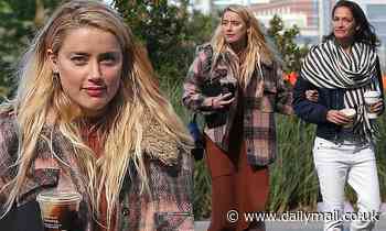 Amber Heard looks as she's spotted arm in arm with new girlfriend Bianca Butti in San Diego