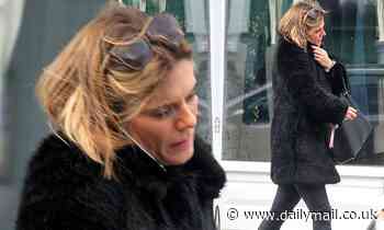 Emilia Fox is casual in a fluffy coat... after her cousin Laurence was in a racism row